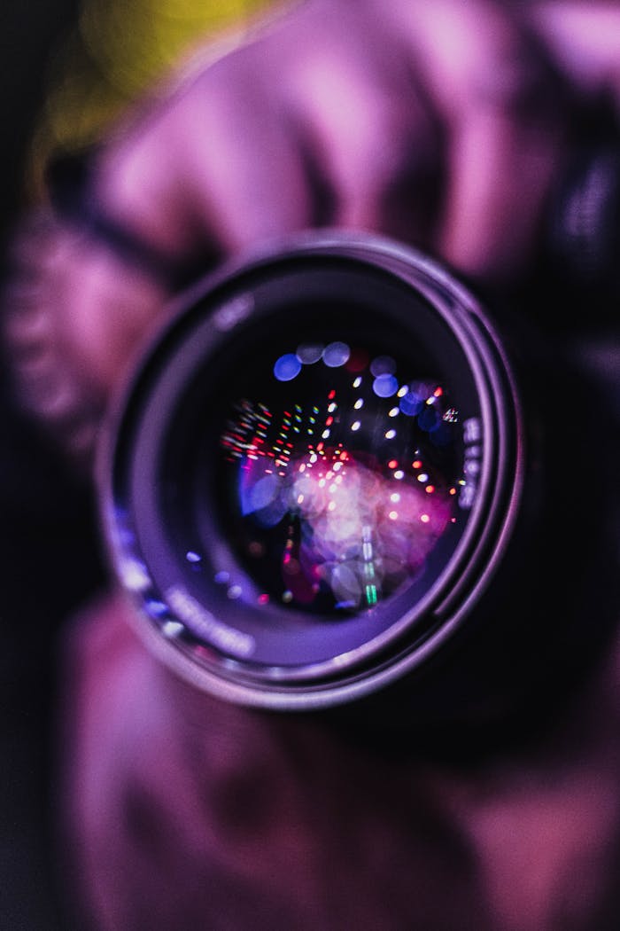 Services-02 Vibrant reflections in a camera lens; an artistic photography close-up.